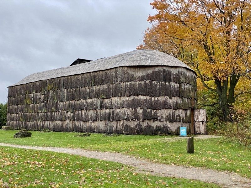 A reconstructed Haudenosonee (Iroquois) longhouse image. Click for full size.