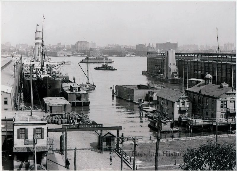 B+W photo of Holland America Line pier 5 & boat clubhouses near 4th St., Hoboken, n.d., c. 1902-1910. Click for full size. B+W photo of Holland America Line pier 5 & boat clubhouses near 4th St., Hoboken, n.d., c. 1902-1910 image. Click for full size.