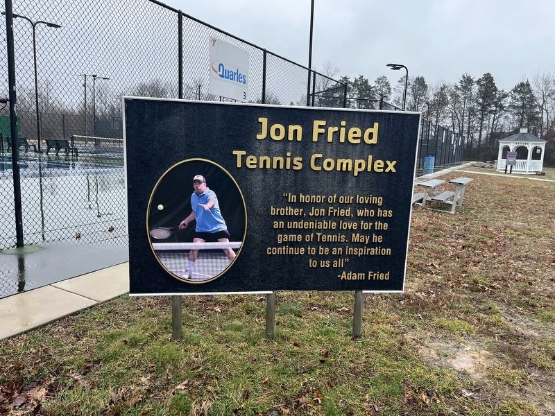 The tennis complex on the grounds is dedicated in Jon Fried's memory image. Click for full size.