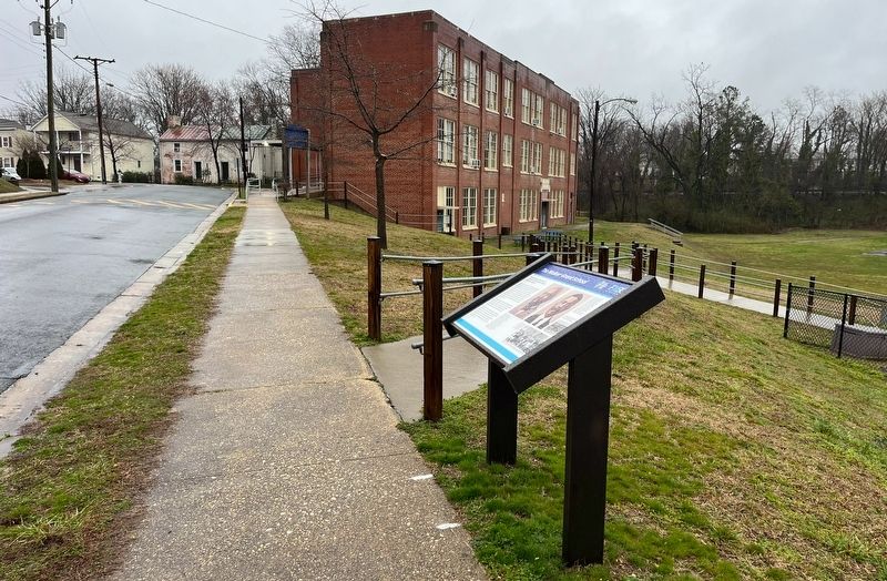 The Walker-Grant School Marker with the school building in the background. Click for full size. The Walker-Grant School Marker with the school building in the background image. Click for full size.