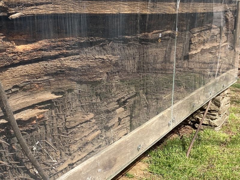 A view of the nails hammered in from inside out to prevent escapes out of the jail. image. Click for full size.
