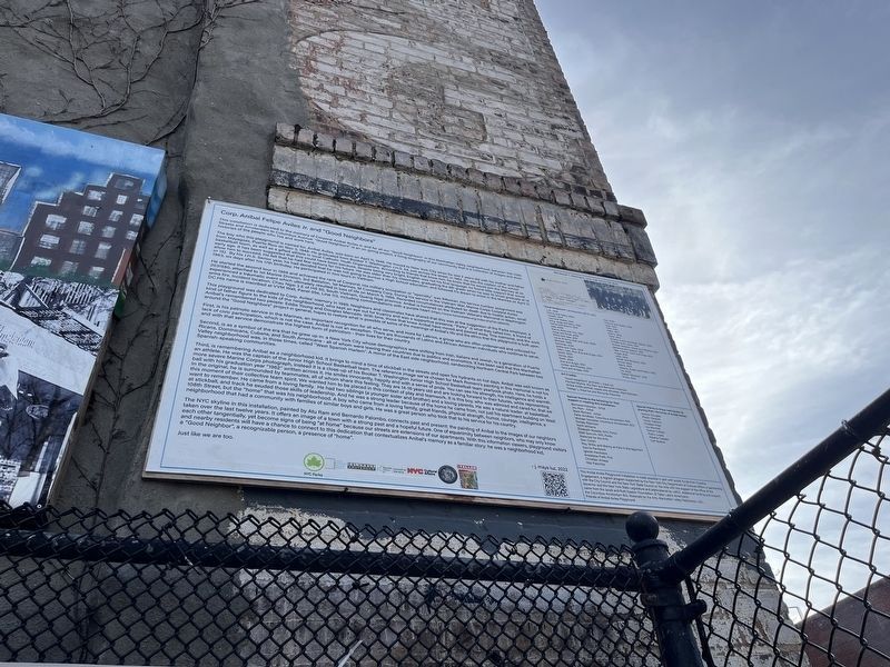 Interpretive banner for the artwork along the brick wall. Click for full size. Interpretive banner for the artwork along the brick wall image. Click for full size.