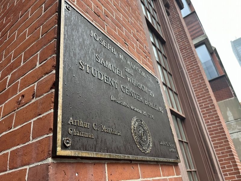 NYU dedication plaque from 1996 on the building from when it became Wunsch Student Center image. Click for full size.