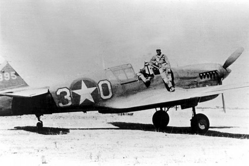 Curtiss P-40L Warhawk of 99th Fighter Squadron, 33rd Fighter Group image. Click for full size.