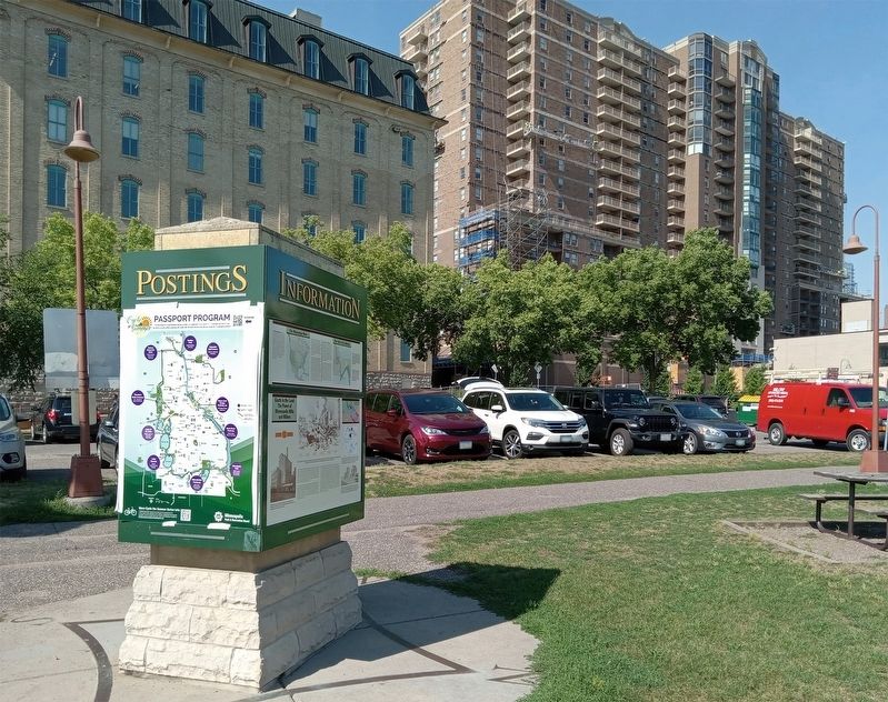 Giants in the Land Marker on kiosk next to the pay parking lot at 100 W. River Parkway image. Click for full size.