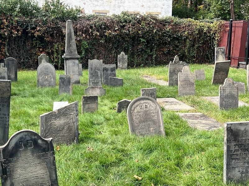 View of cemetery through fence image. Click for full size.