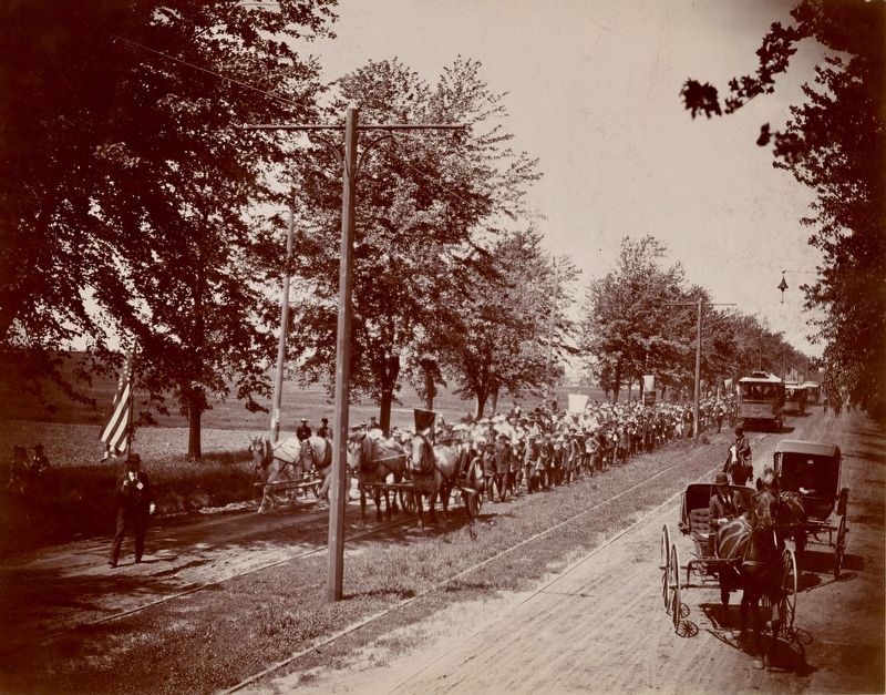 School children pulling Stevens house to Minnehaha Park image. Click for full size.