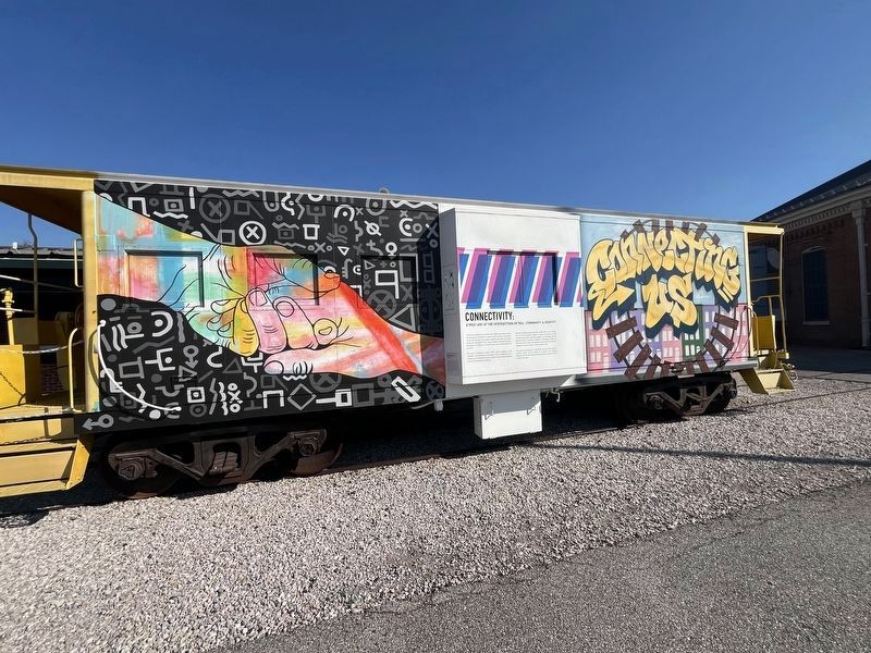 The side of the car featuring <i>Vagabond Sanskrit</i> and <i>Untitled</i>. Click for full size. The side of the car featuring <i>Vagabond Sanskrit</i> and <i>Untitled</i> image. Click for full size.