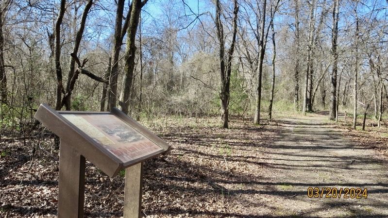 Marker along the trail heading east. image. Click for full size.