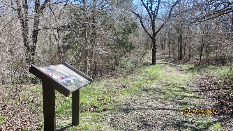 The Confederate Center Marker looking East along Trail Three. image. Click for full size.