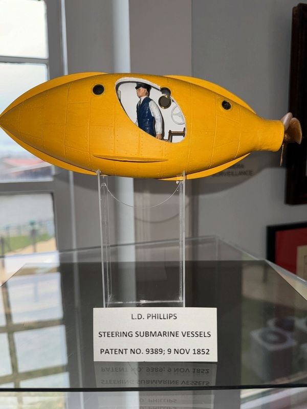 Model of submarine is located inside museum image. Click for full size.