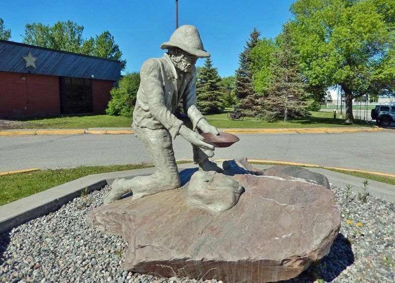 The Porcupine Gold Rush Sculpture<br>by Maurice Gaudreault image. Click for full size.
