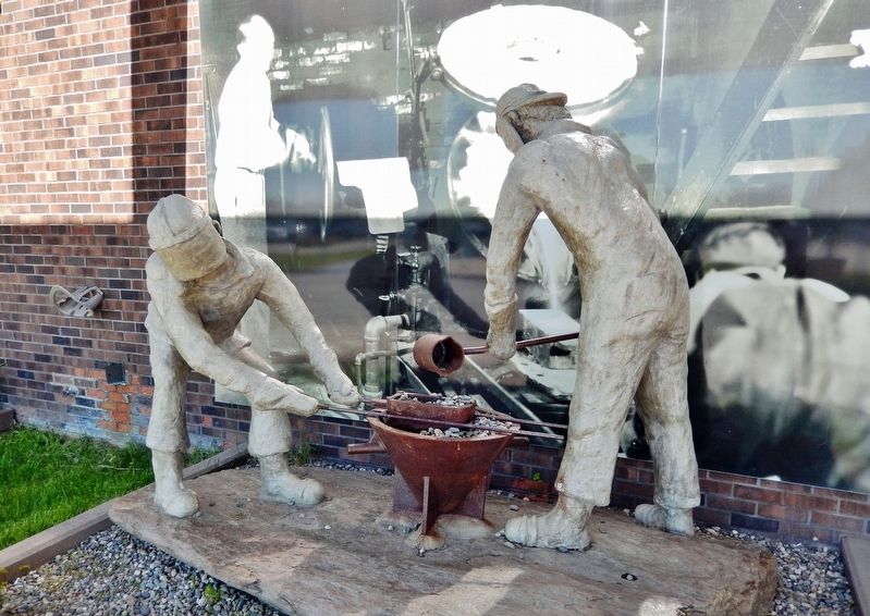 Refinery Pour Sculpture and Mural. Click for full size. Refinery Pour Sculpture and Mural image. Click for full size.