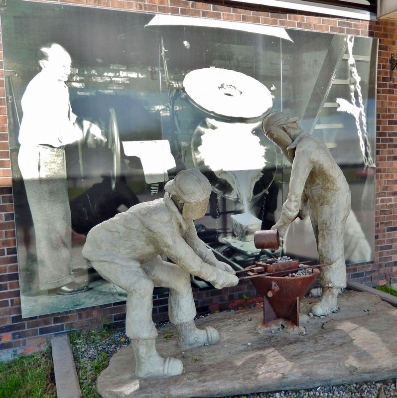 Refinery Pour Sculpture and Mural. Click for full size. Refinery Pour Sculpture and Mural image. Click for full size.