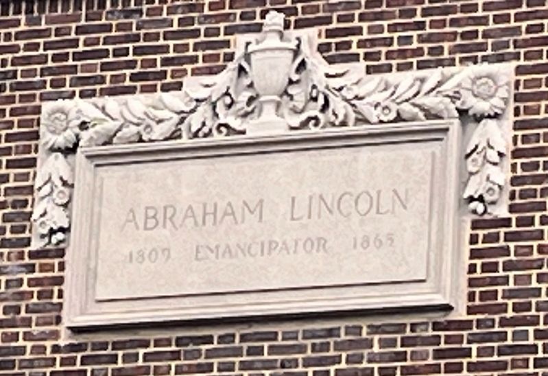 Plaque on the left side of the school image. Click for full size.