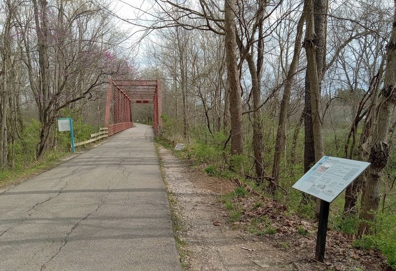 The Harris Ford Bridge Marker on the Bloomington Rail Trail just south of the bridge. Click for full size. The Harris Ford Bridge Marker on the Bloomington Rail Trail just south of the bridge image. Click for full size.