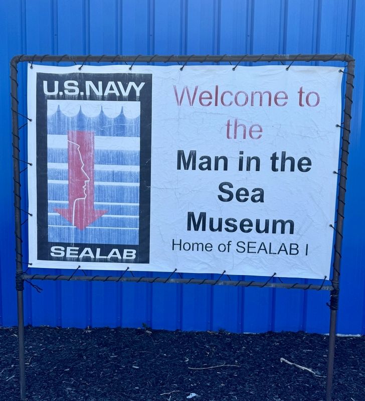 Man in the Sea Museum sign image. Click for full size.