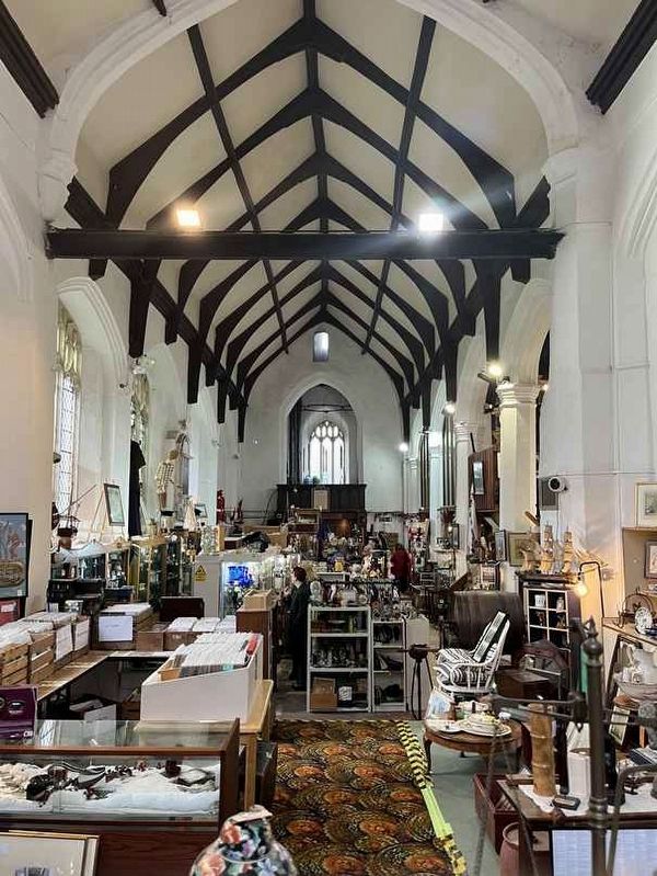 All Saints Church interior (now in use as an antique store) image. Click for full size.