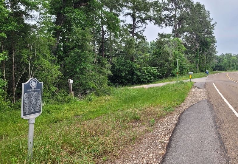 The view of the John Edens Cemetery Marker along the highway image. Click for full size.