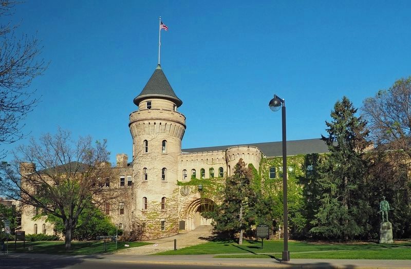 Spanish-American War Memorial on the Armory, between the turret and the arched gateway image. Click for full size.
