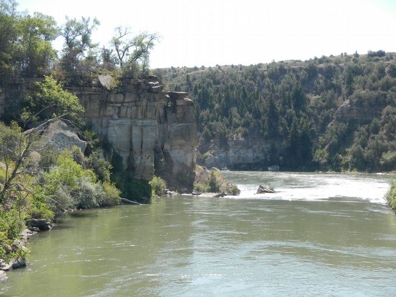 The Missouri River heading downstream after passing through the power plant. image. Click for full size.
