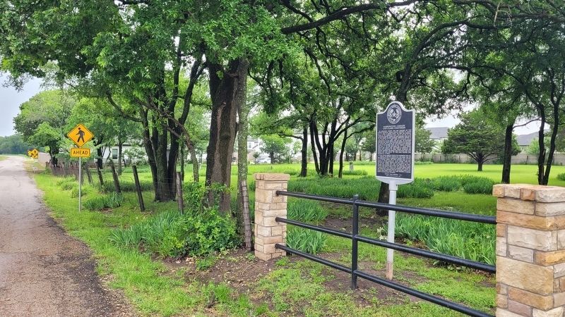 The view of the Harrington, Cassady and Clark Cemeteries Marker along the street image. Click for full size.
