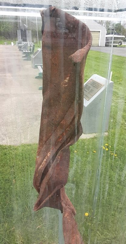 Twin Towers Remnant in "We Stand Together" 9/11 Memorial. Click for full size. Twin Towers Remnant in "We Stand Together" 9/11 Memorial image. Click for full size.
