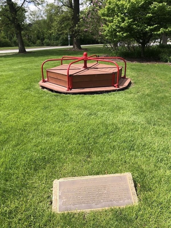The merry-go-round and its marker. Click for full size. The merry-go-round and its marker image. Click for full size.