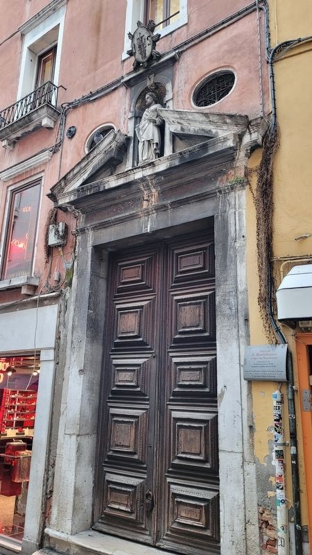 The entrance to the Chiesa di S. Bartolomeo (vulgo San Bartolomio) and Marker image. Click for full size.