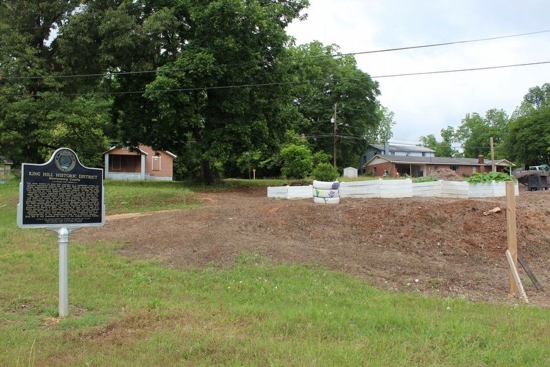 Marker with community garden in background image. Click for full size.
