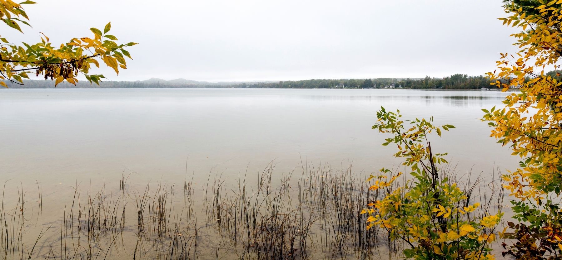 Round Lake, Emmet County Michigan, on a Cloudy Autumn Day. Click for full size. Round Lake, Emmet County Michigan, on a Cloudy Autumn Day image. Click for full size.