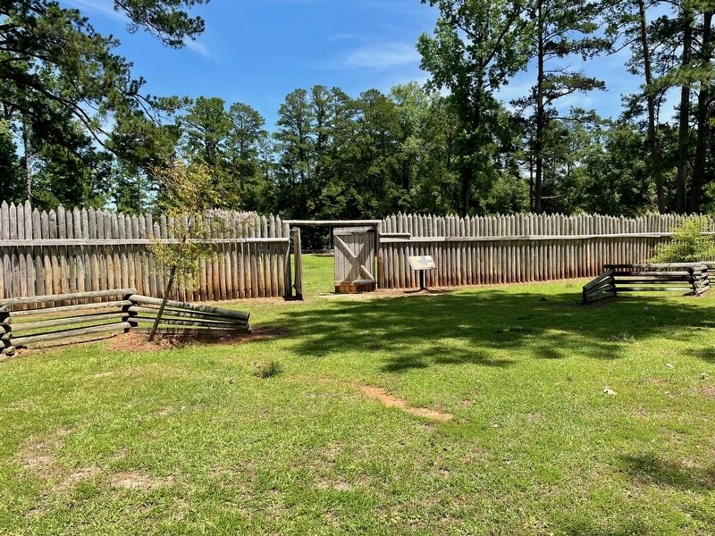 Main Compound Marker on east wall. image. Click for full size.