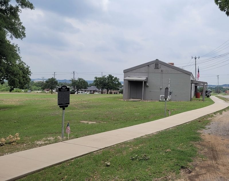 The view of the LTC John S Palmer Jr Marker along the sidewalk image. Click for full size.