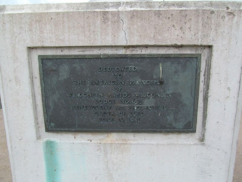 Plaque at flag.. Click for full size. Plaque at flag. image. Click for full size.