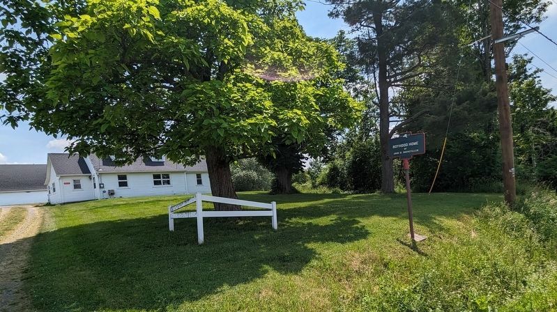 Wide view of John D. Rockefeller Boyhood Home Marker. Click for full size. Wide view of John D. Rockefeller Boyhood Home Marker image. Click for full size.