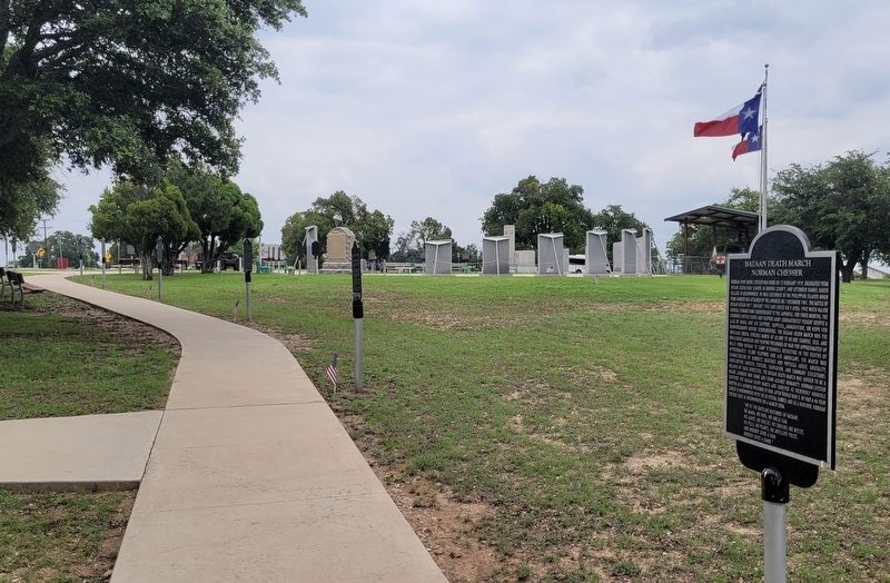 The view of the Norman Chesser Marker along the pathway image. Click for full size.
