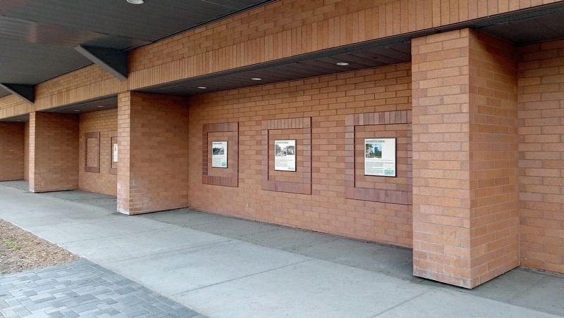 The Resurrection of Washington Avenue Marker (right) on the north side of the Gateway Parking Ramp image. Click for full size.