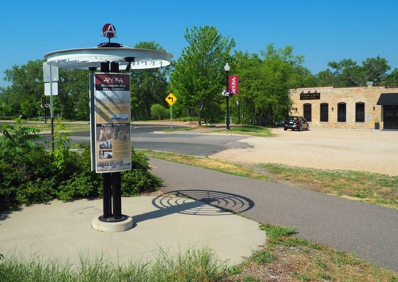 Marker with the Pease Printery (now The Mill Site event center) at right. Click for full size. Marker with the Pease Printery (now The Mill Site event center) at right image. Click for full size.