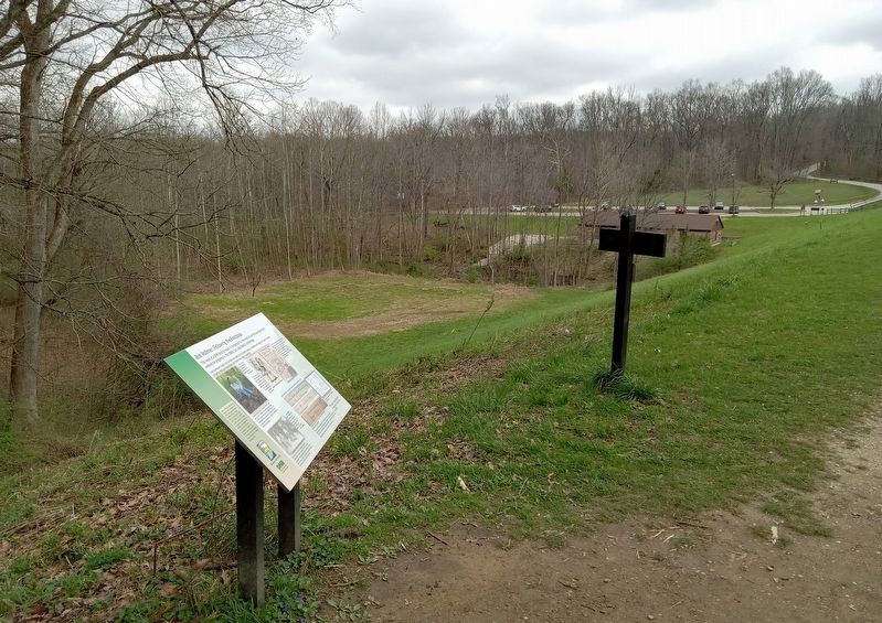 Bob Vollmer: Following the Footsteps Marker on the Ogle Lake Dam. Click for full size. Bob Vollmer: Following the Footsteps Marker on the Ogle Lake Dam image. Click for full size.