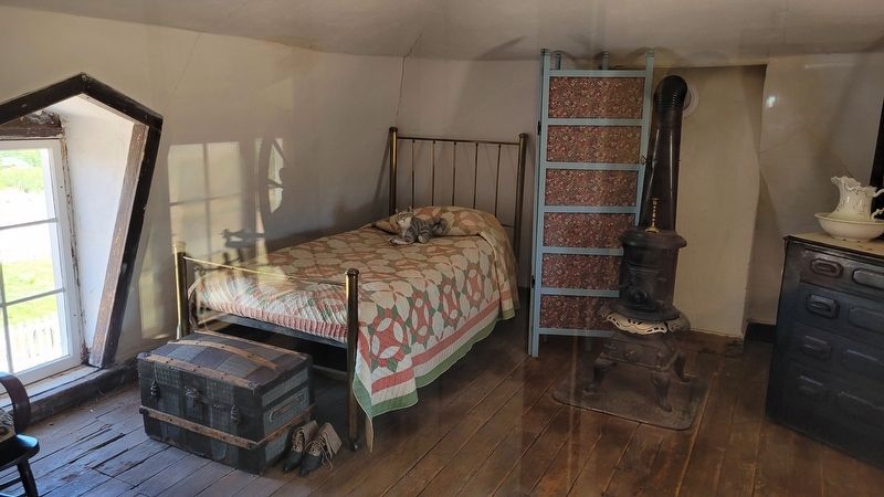 Upstairs bedroom in the Commanding Officers Quarters. Click for full size. Upstairs bedroom in the Commanding Officers Quarters image. Click for full size.