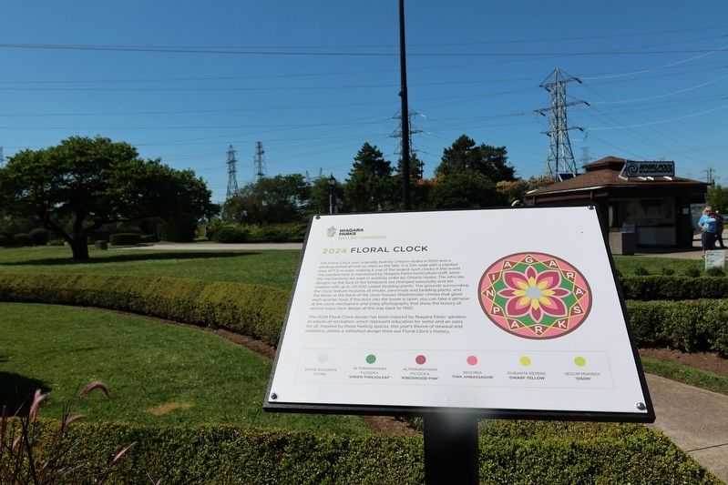 2024 Floral Clock Marker. Click for full size. 2024 Floral Clock Marker image. Click for full size.