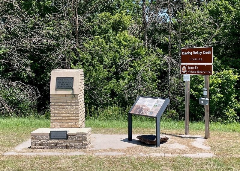 "Rock" can be seen under the middle interpretive marker. image. Click for full size.