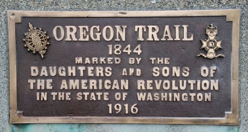 Updated OT 1844 Marker plaque. The DAR and SAR insignias were replaced after being stolen years ago. image. Click for full size.