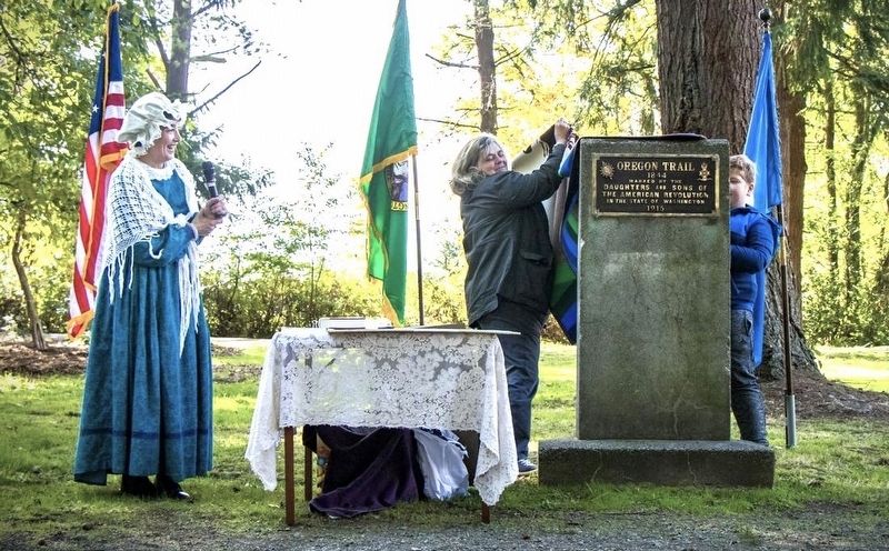 The unveiling of the Oregon Trail 1844 Marker at Borst Park for its 2016 rededication.. Click for full size. The unveiling of the Oregon Trail 1844 Marker at Borst Park for its 2016 rededication. image. Click for full size.