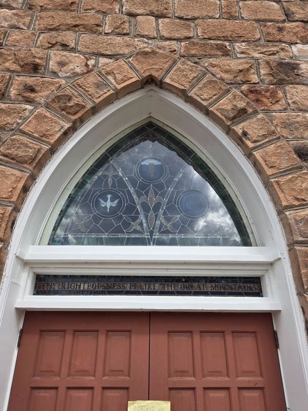 Stained glass above main entrance. Click for full size. Stained glass above main entrance image. Click for full size.