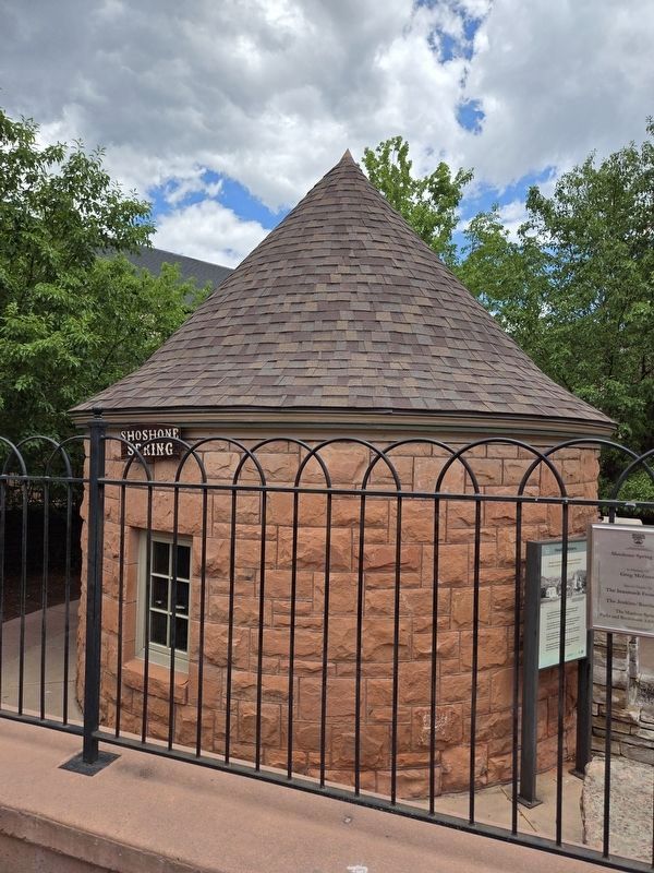 Shoshone Spring brick structure from sidewalk on Manitou Ave. image. Click for full size.
