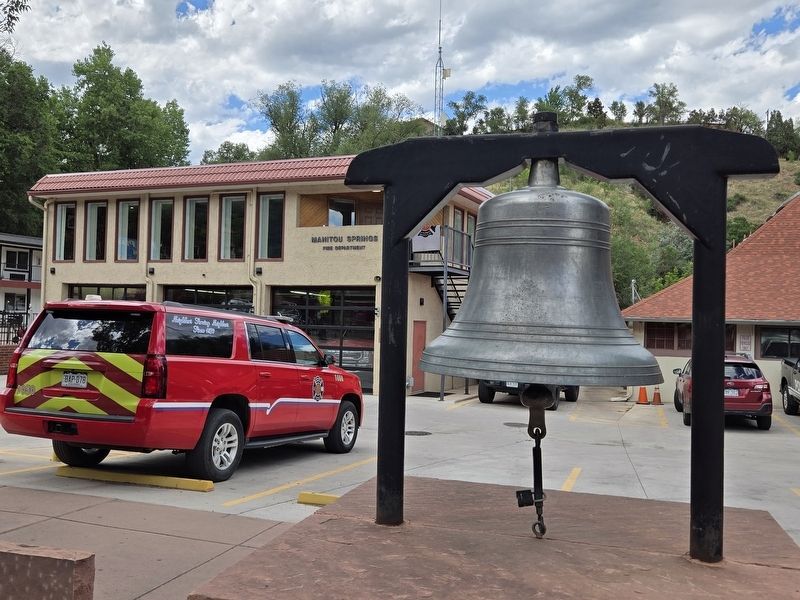 1884 Manitou Springs firebell with fire station in background. Click for full size. 1884 Manitou Springs firebell with fire station in background image. Click for full size.