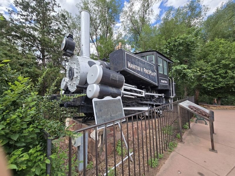 Pike's Peak Marker and Manitou and Pike's Peak Railway Locomotive. Click for full size. Pike's Peak Marker and Manitou and Pike's Peak Railway Locomotive image. Click for full size.