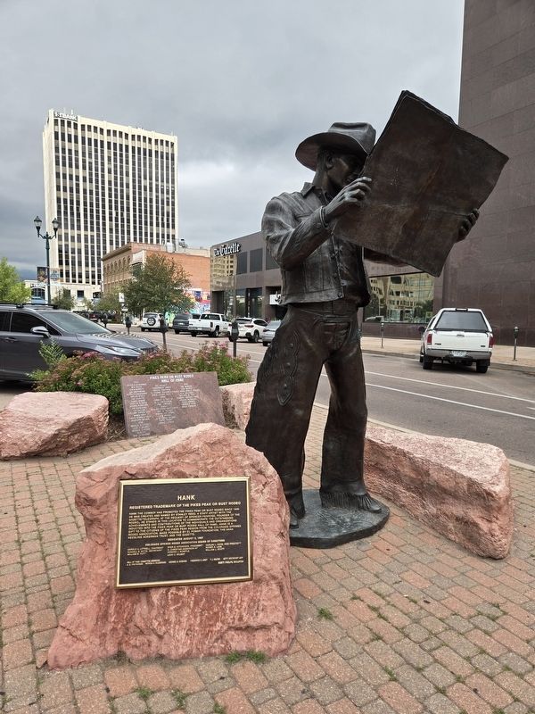 Hank Marker, Hank the Cowboy statue, Pike's Peak or Bust Rodeo hall of fame slate. Click for full size. Hank Marker, Hank the Cowboy statue, Pike's Peak or Bust Rodeo hall of fame slate image. Click for full size.