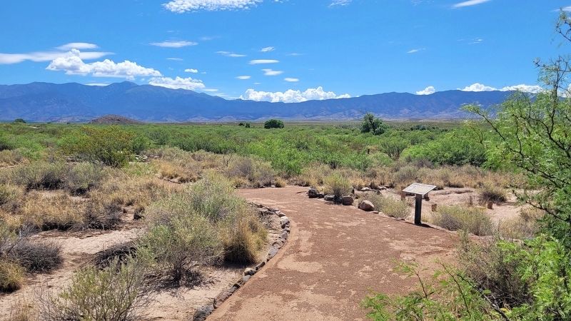 The view of the Adobe Surface House Marker with the mountains behind them. Click for full size. The view of the Adobe Surface House Marker with the mountains behind them image. Click for full size.